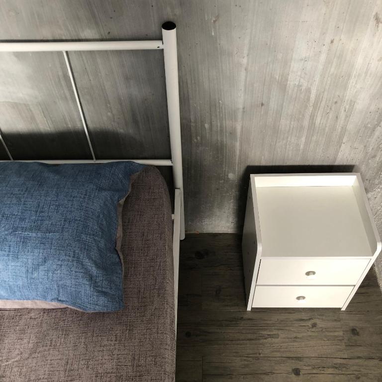 Postel nebo postele na pokoji v ubytování Rembulan Langkawi Guesthouse