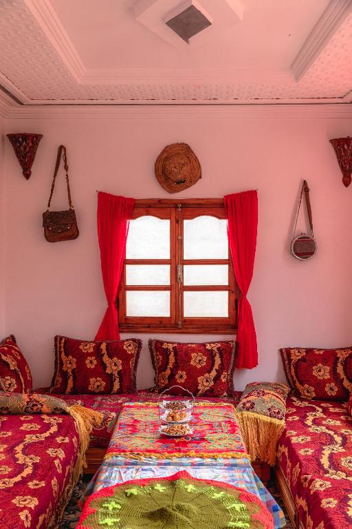 Postel nebo postele na pokoji v ubytování Amazigh Family Riad