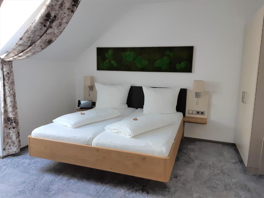 Postel nebo postele na pokoji v ubytování Hotel Kongress