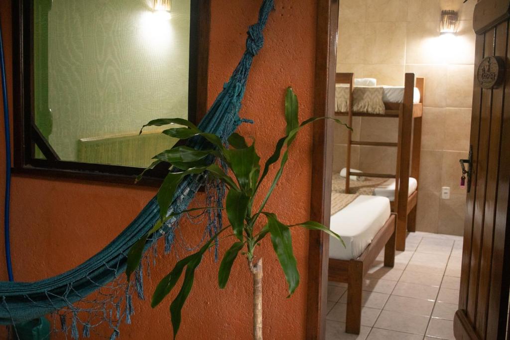 Cama ou camas em um quarto em Pousada Lanai