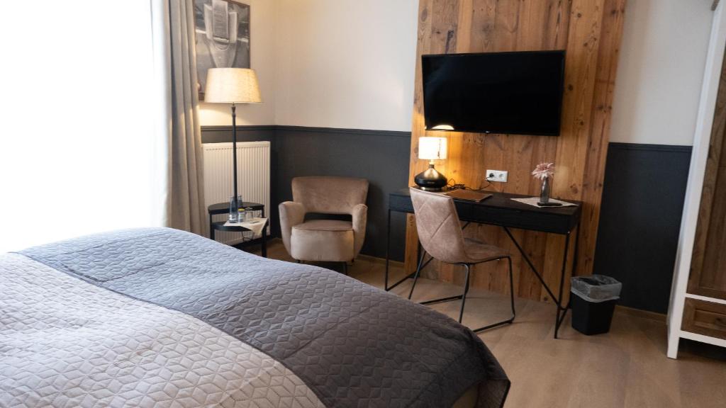 Postel nebo postele na pokoji v ubytování Altstadt-Hotel