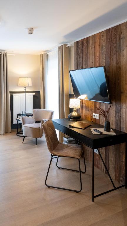 TV a/nebo společenská místnost v ubytování Altstadt-Hotel