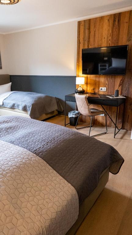 Postel nebo postele na pokoji v ubytování Altstadt-Hotel
