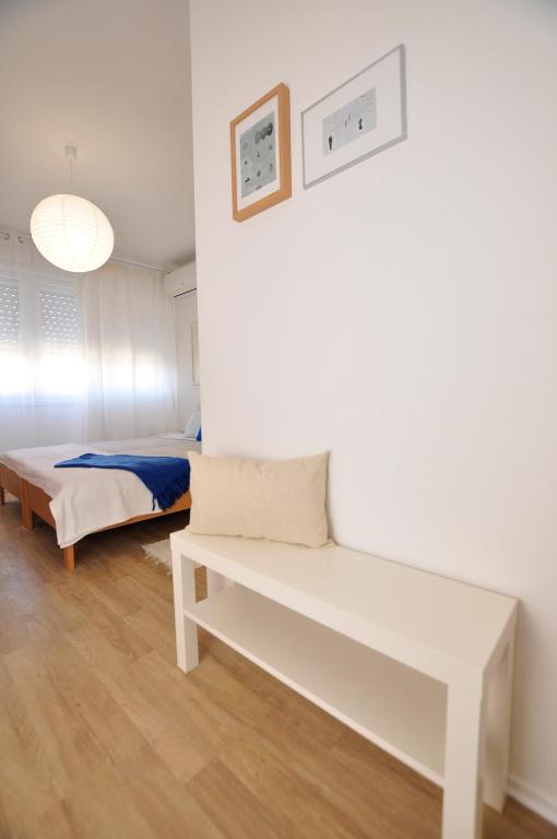 Posteľ alebo postele v izbe v ubytovaní Room & Studio In the Centre