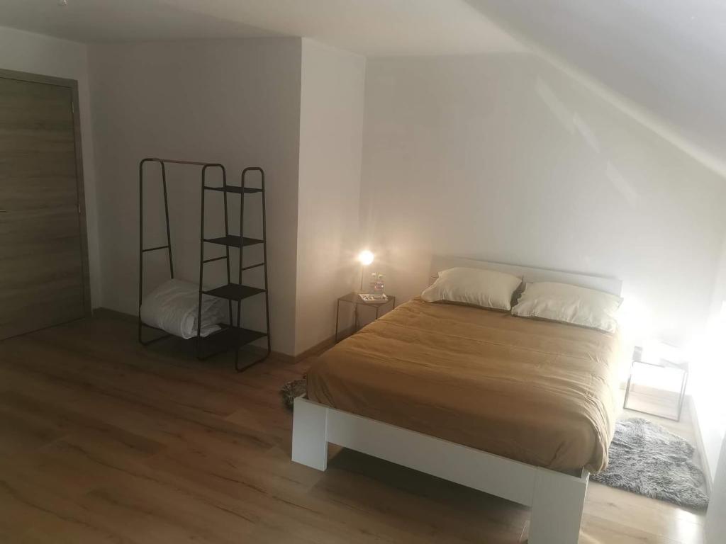Postel nebo postele na pokoji v ubytování Le caillou Blanc