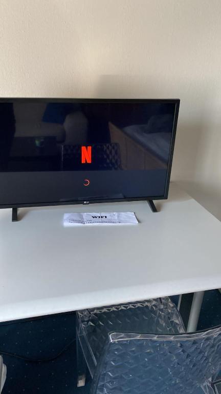 TV a/nebo společenská místnost v ubytování Casa Koraal - Old Town Zug