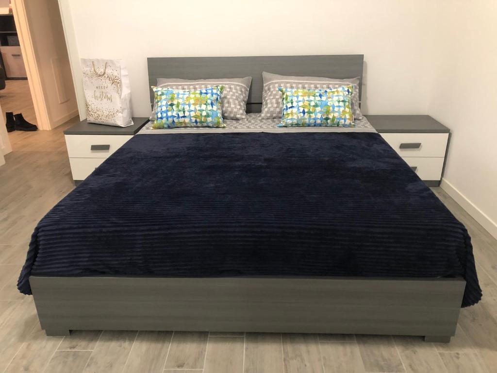 Posteľ alebo postele v izbe v ubytovaní SweetHome