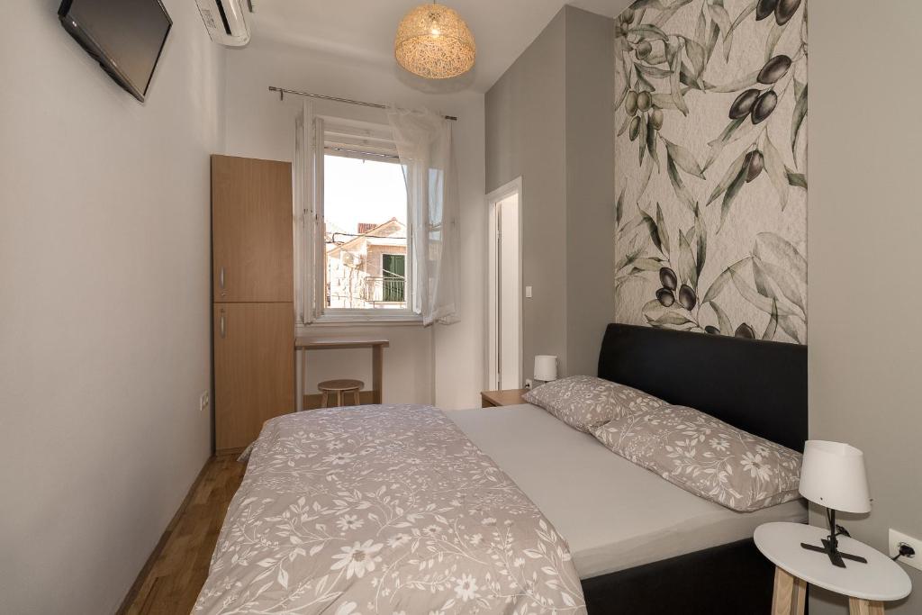 Postel nebo postele na pokoji v ubytování Hostel Split Backpackers