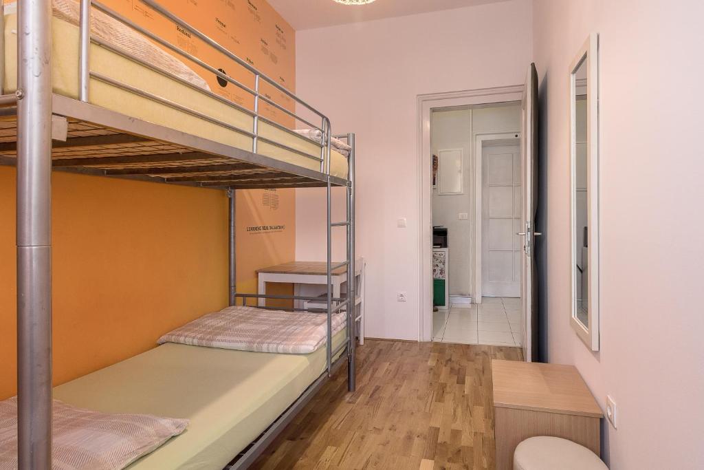 Postel nebo postele na pokoji v ubytování Hostel Split Backpackers