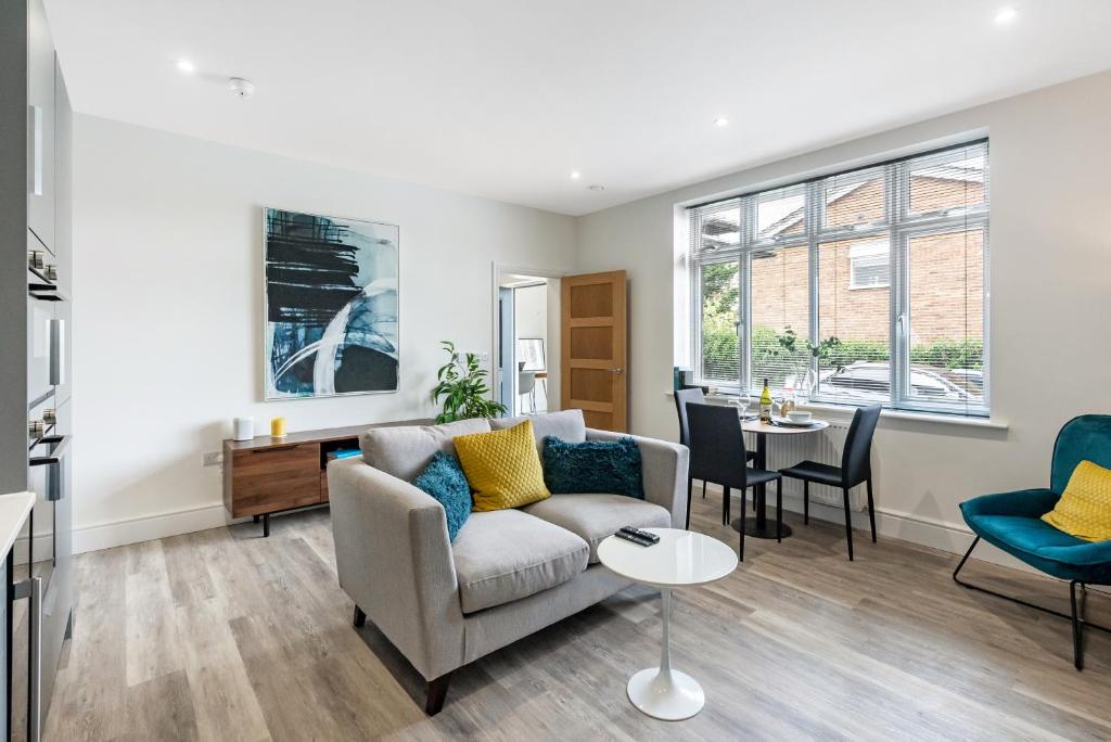 a living room with a couch and a table at Tailored Stays - Union lane in Chesterton