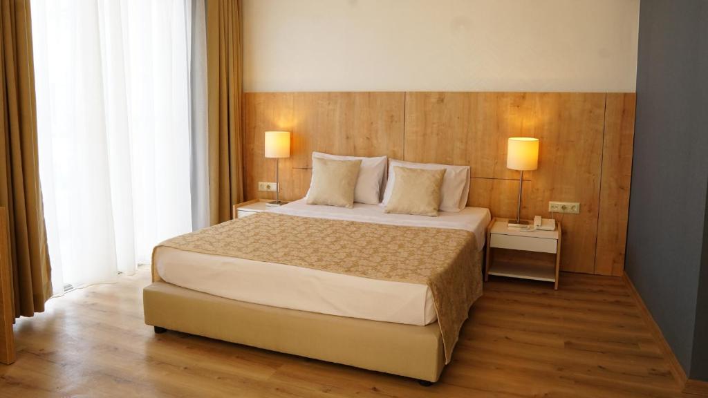 Postel nebo postele na pokoji v ubytování Hotel Felizya Kemer