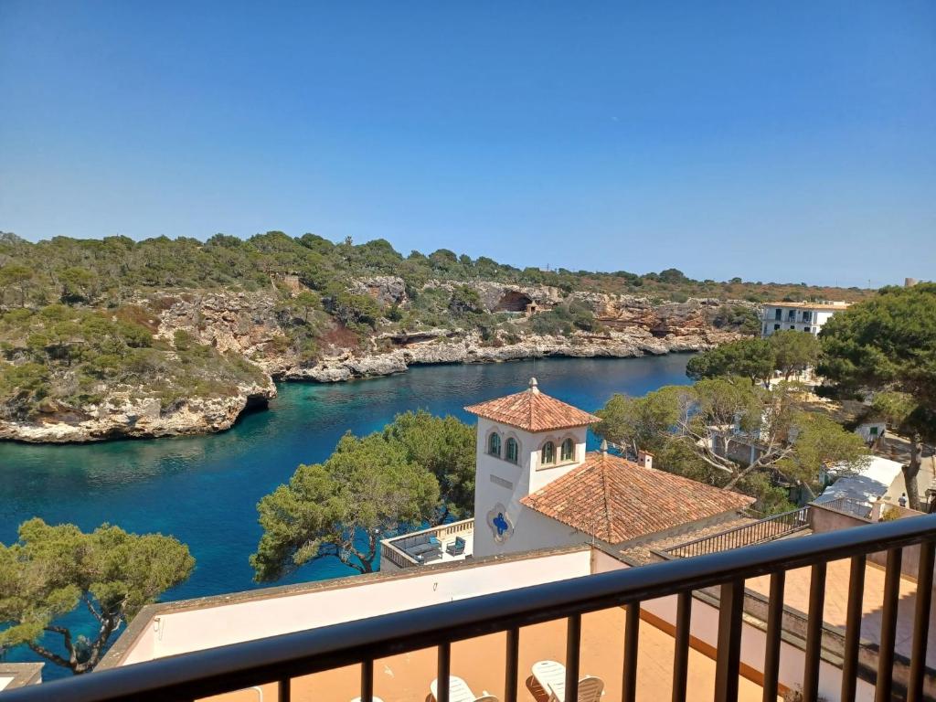 a view of a river from a balcony at La Marina CH in Cala Figuera