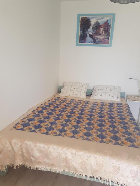 A bed or beds in a room at Bungaló Santa Ana