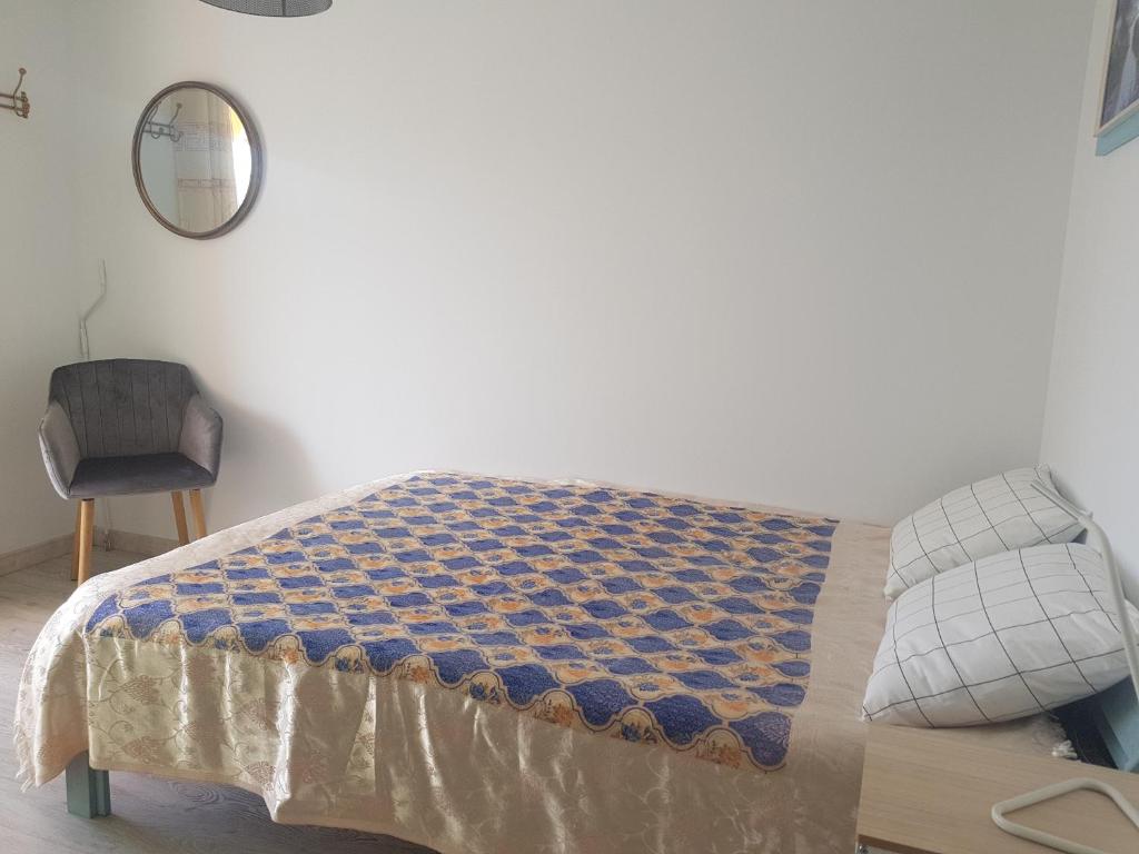 A bed or beds in a room at Bungaló Santa Ana