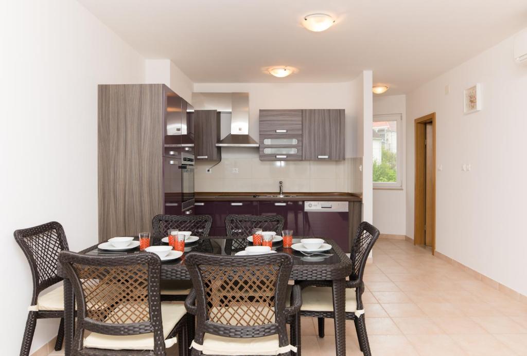 Kuchyň nebo kuchyňský kout v ubytování Apartments Barbara Sutivan