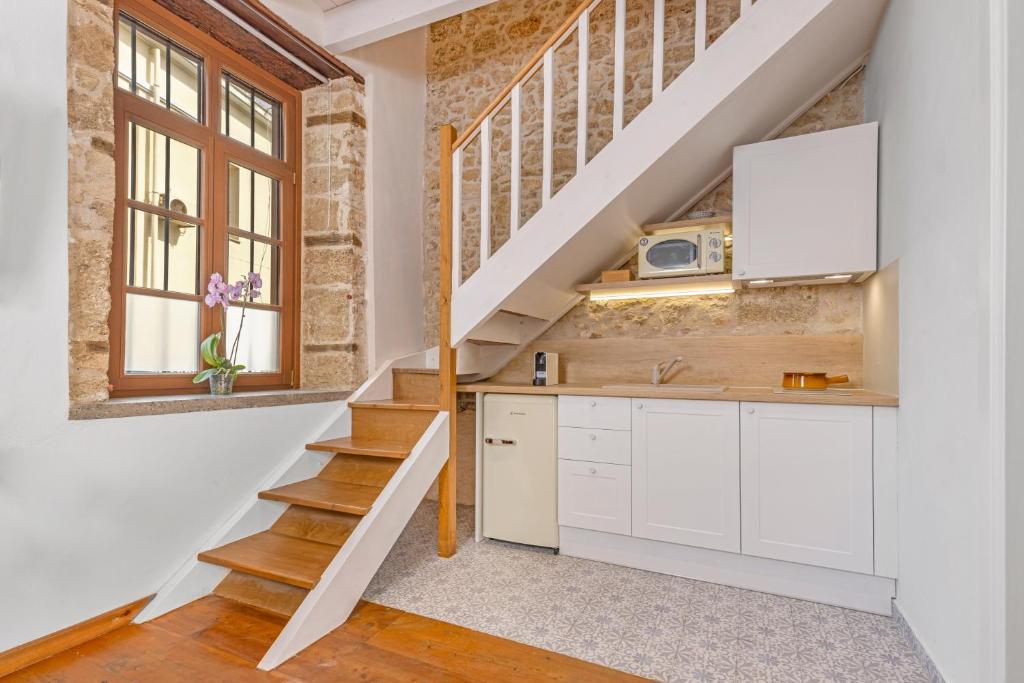 Kuchyň nebo kuchyňský kout v ubytování Sala Historical Luxury Suites