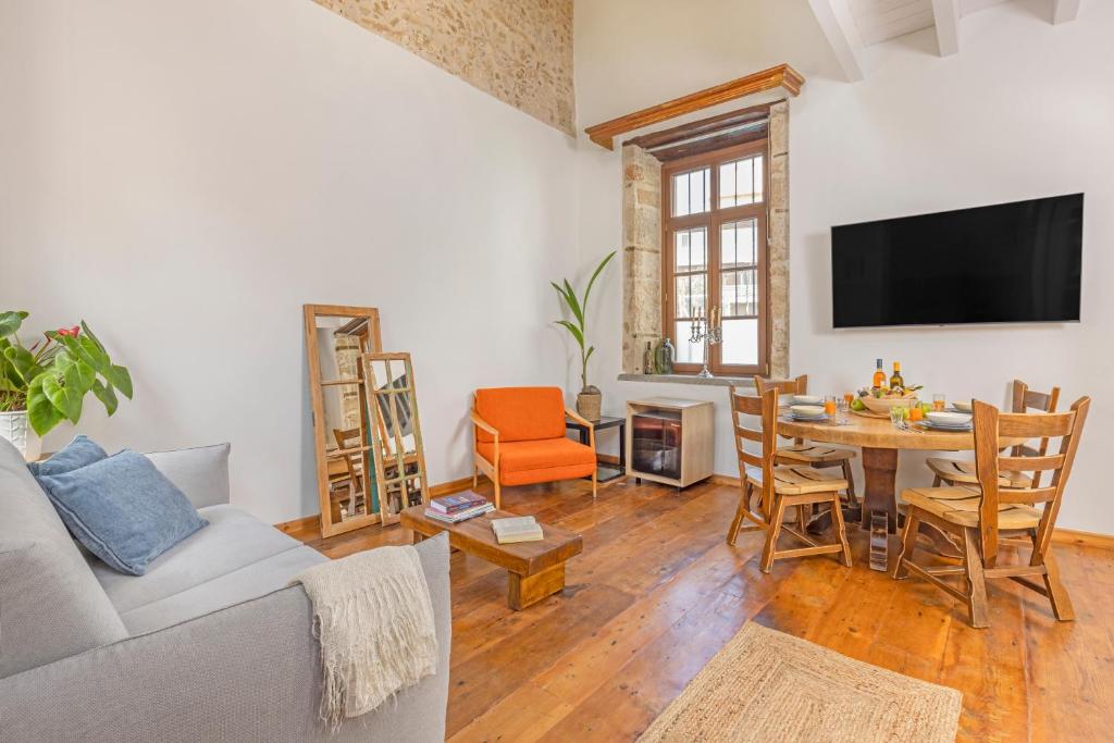 TV a/nebo společenská místnost v ubytování Sala Historical Luxury Suites