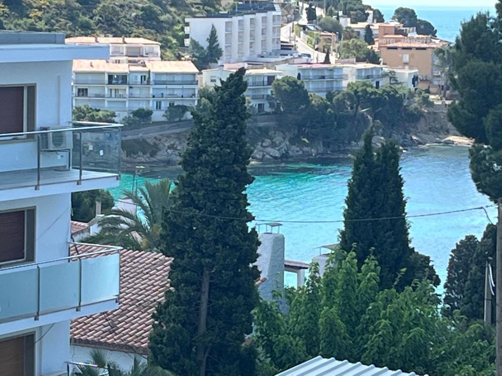 a view of the ocean from a building at Apartamiento canyelles in Roses