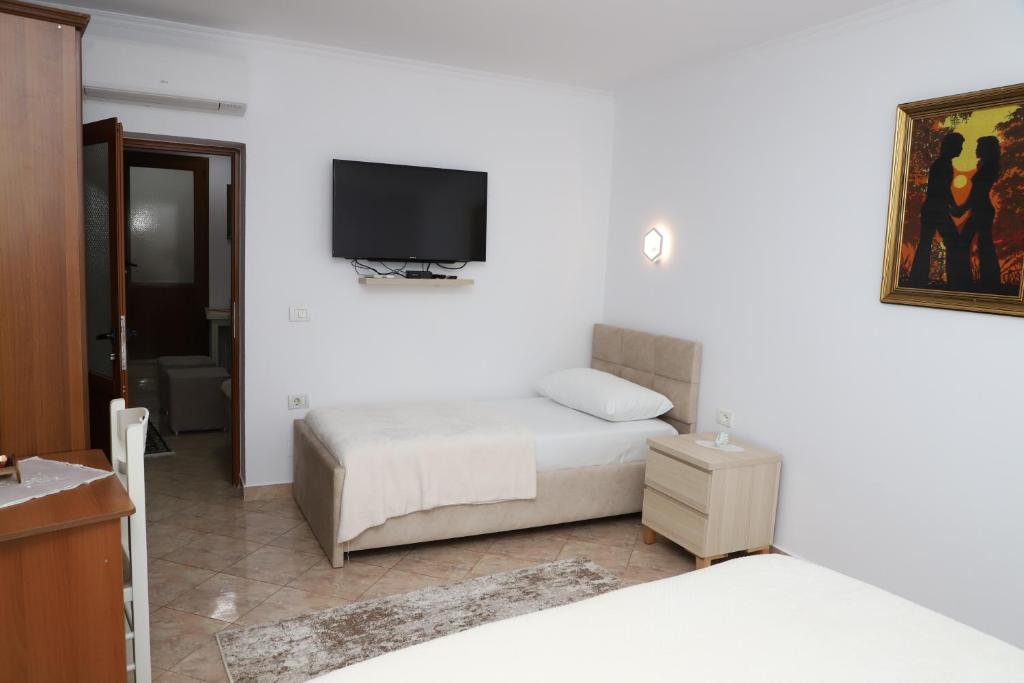 Postel nebo postele na pokoji v ubytování Downtown Apartment 2