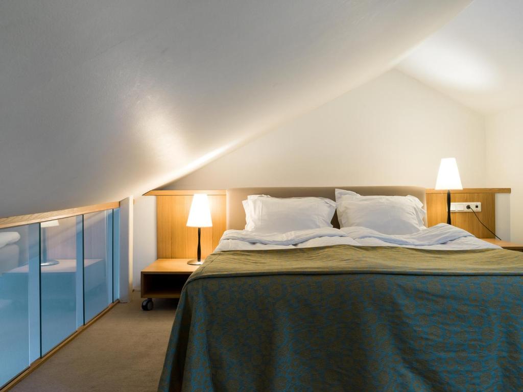 Postel nebo postele na pokoji v ubytování Elite Hotel Knaust