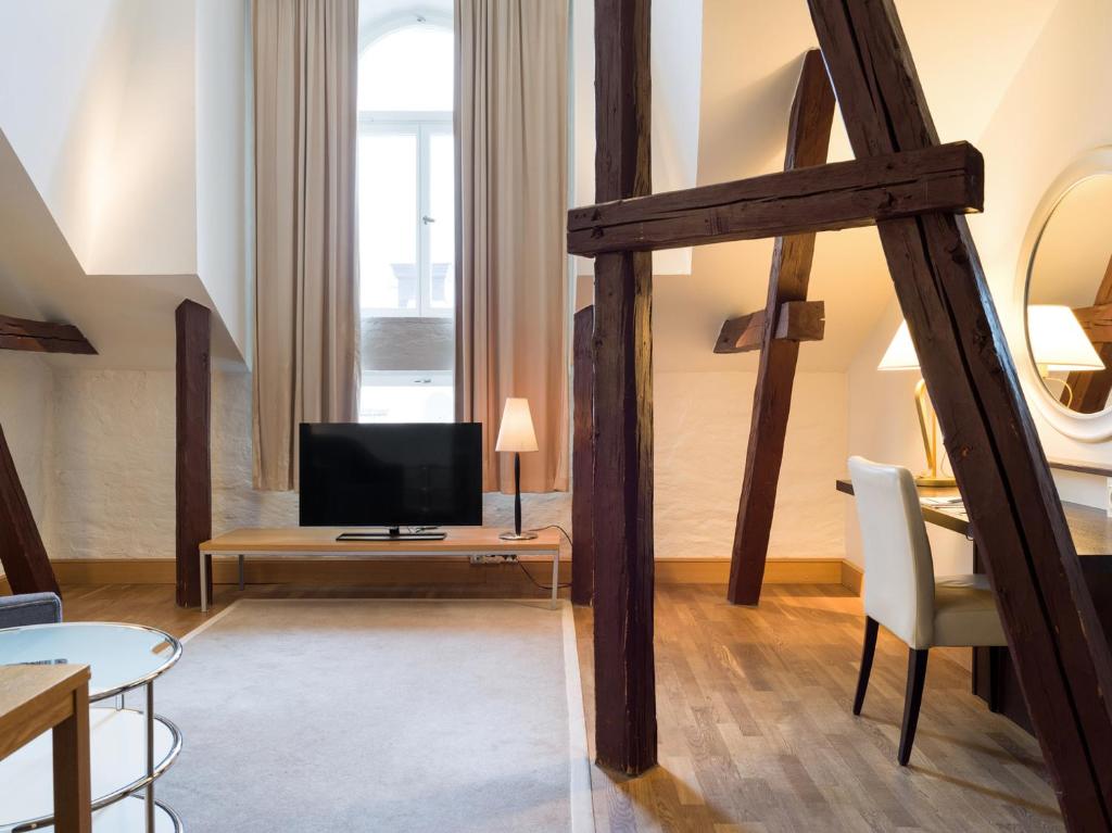 TV a/nebo společenská místnost v ubytování Elite Hotel Knaust