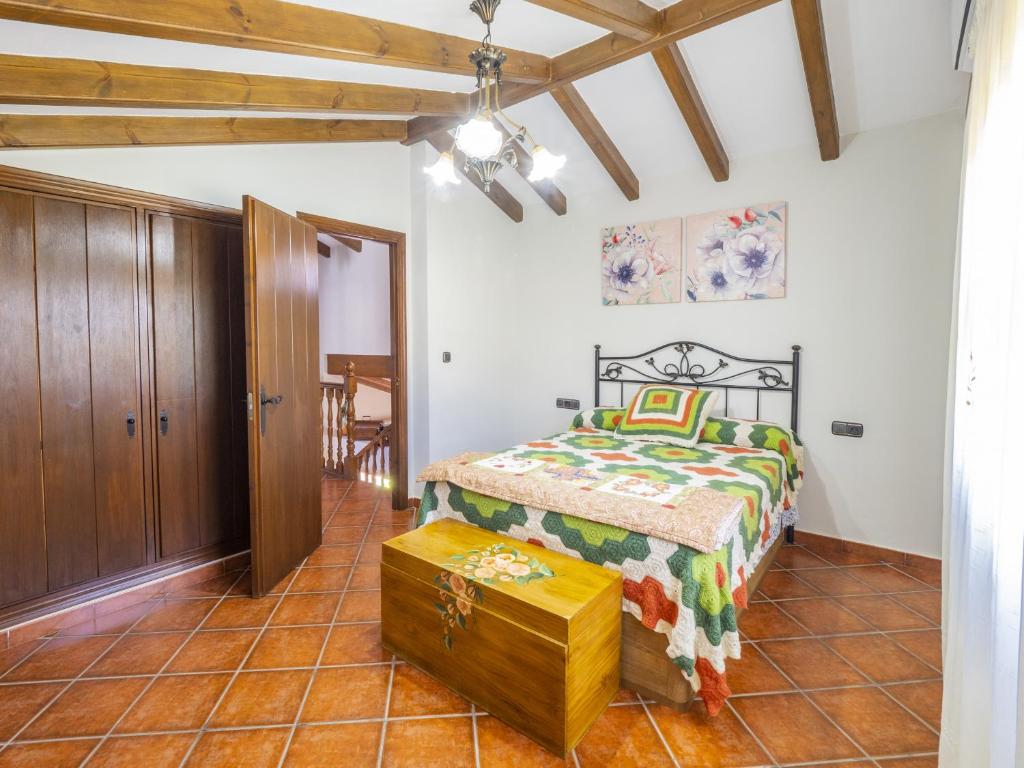 Posteľ alebo postele v izbe v ubytovaní Cubo's Villa El Sauce de Coin
