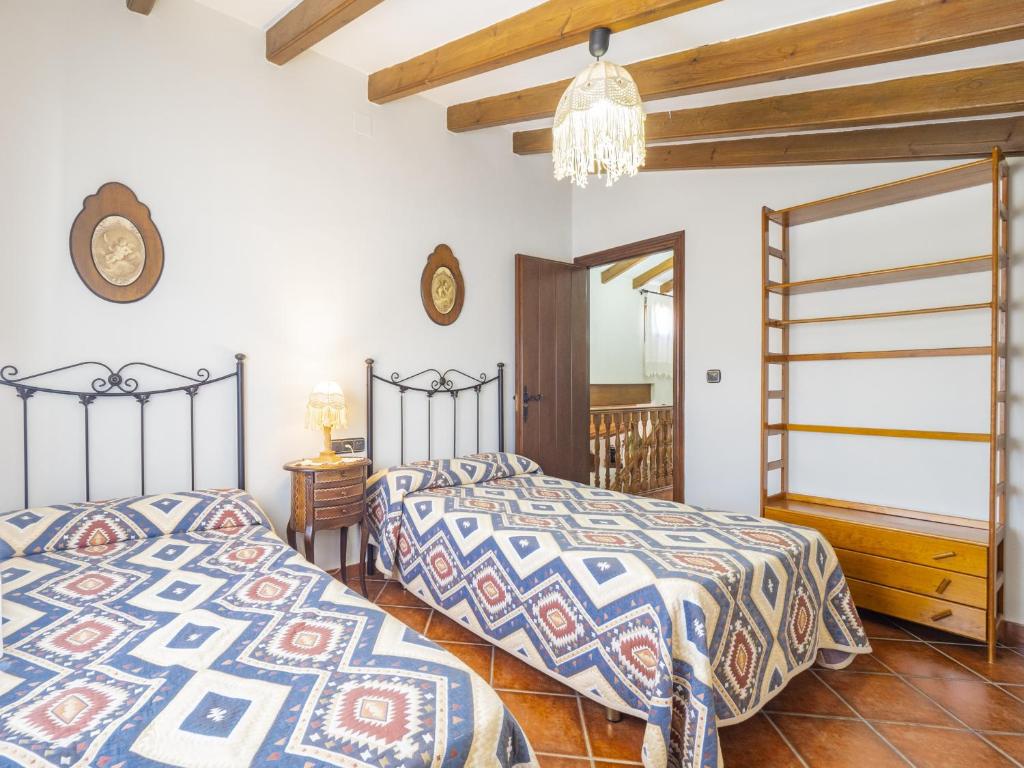 Posteľ alebo postele v izbe v ubytovaní Cubo's Villa El Sauce de Coin