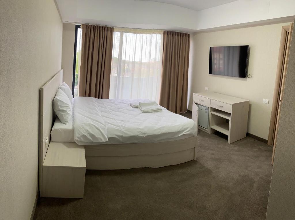 Postel nebo postele na pokoji v ubytování Hotel Alis