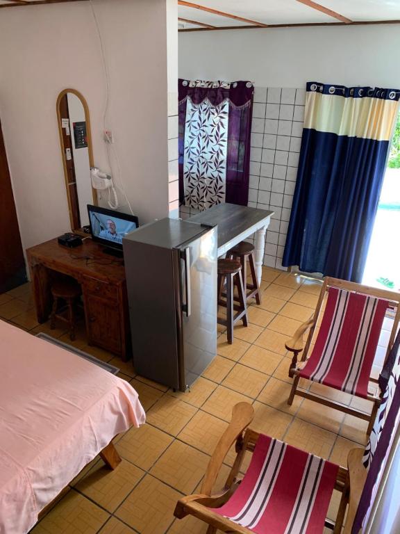Postel nebo postele na pokoji v ubytování Villa Manoir
