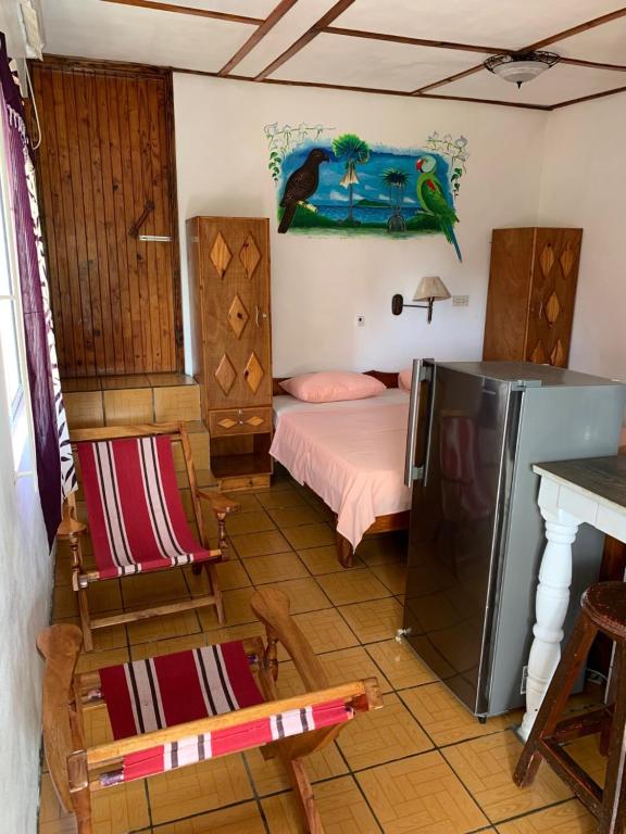 Postel nebo postele na pokoji v ubytování Villa Manoir