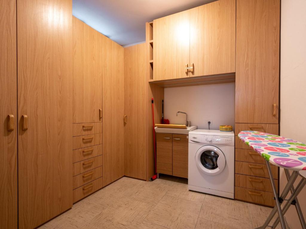 Kuchyň nebo kuchyňský kout v ubytování Holiday Home Iride by Interhome