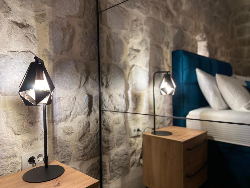 Postel nebo postele na pokoji v ubytování Apartment Caserma