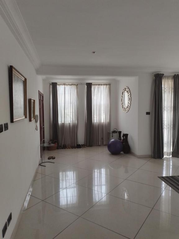 Coin salon dans l'établissement Tricia' s Place- One family at a time