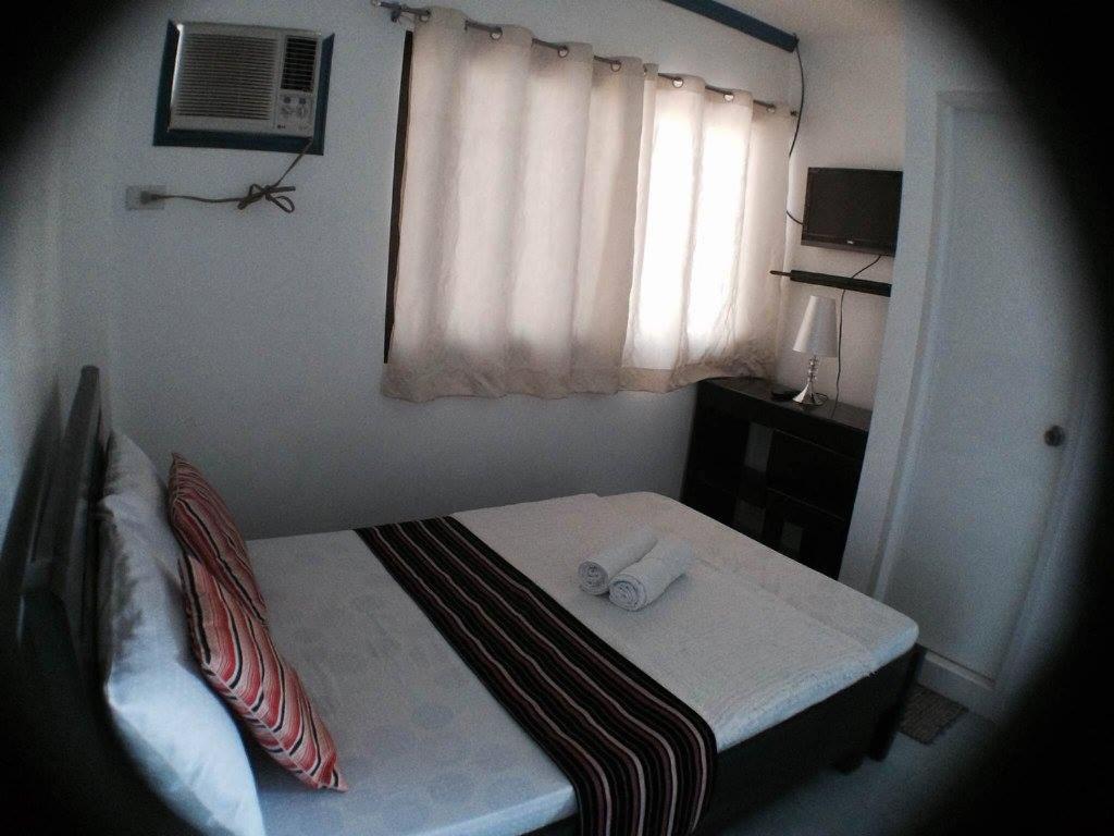 Postel nebo postele na pokoji v ubytování AA TRAVELLERS PAD