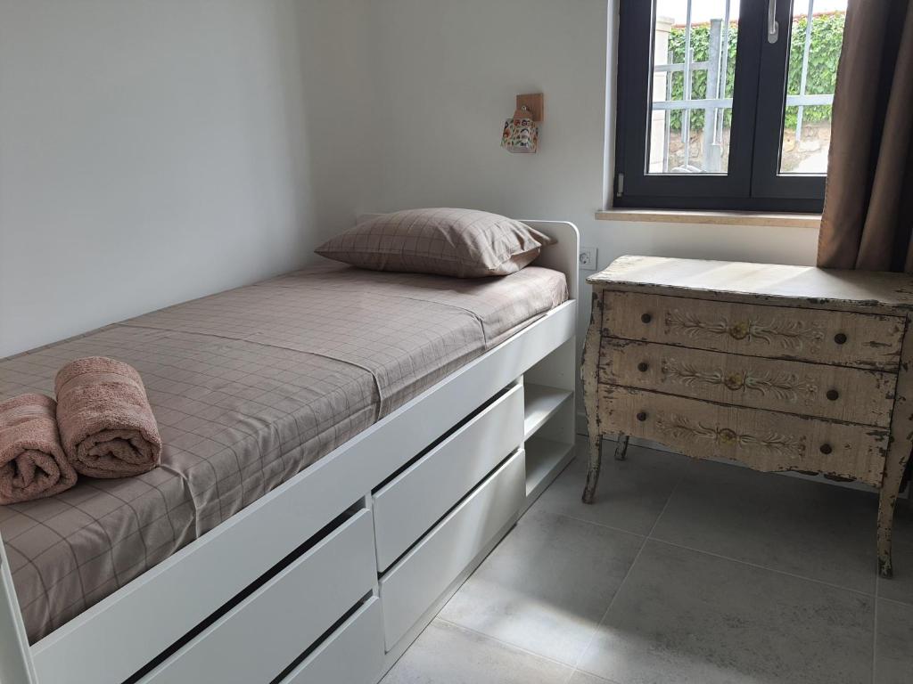 Postel nebo postele na pokoji v ubytování Apartments Krista Medveja