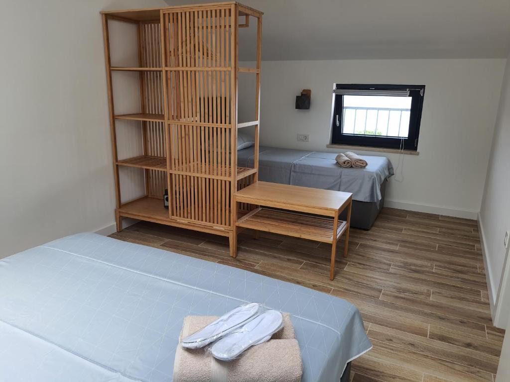 Postel nebo postele na pokoji v ubytování Apartments Krista Medveja