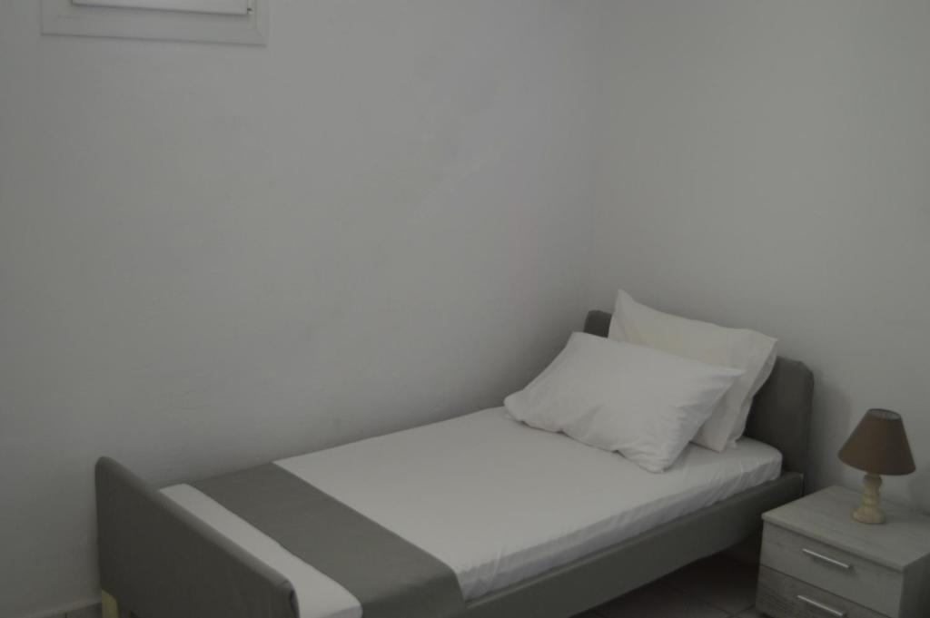 Posteľ alebo postele v izbe v ubytovaní Revel Mykonos 6
