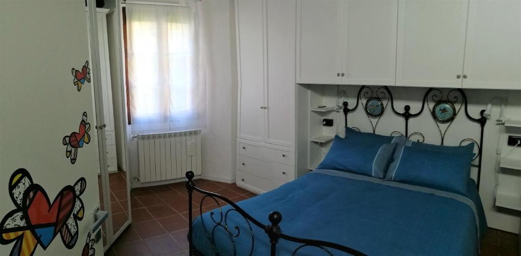 A bed or beds in a room at Il Sasso appartamento