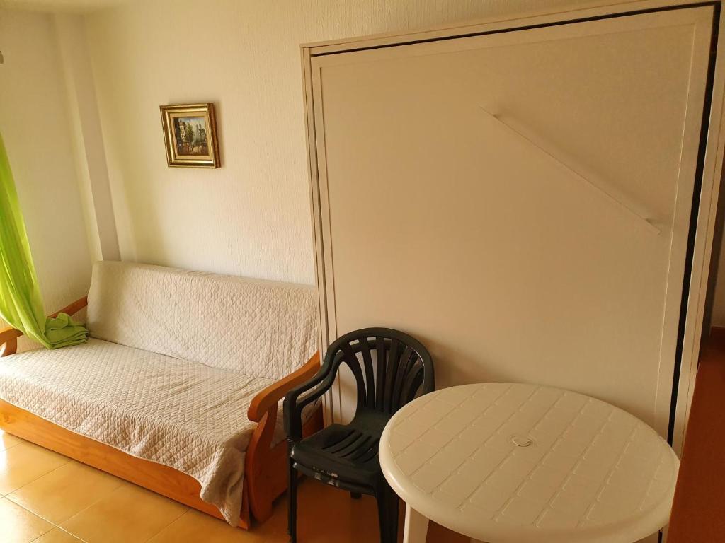 Postel nebo postele na pokoji v ubytování Apartamentos Vacacionales Atlanterra
