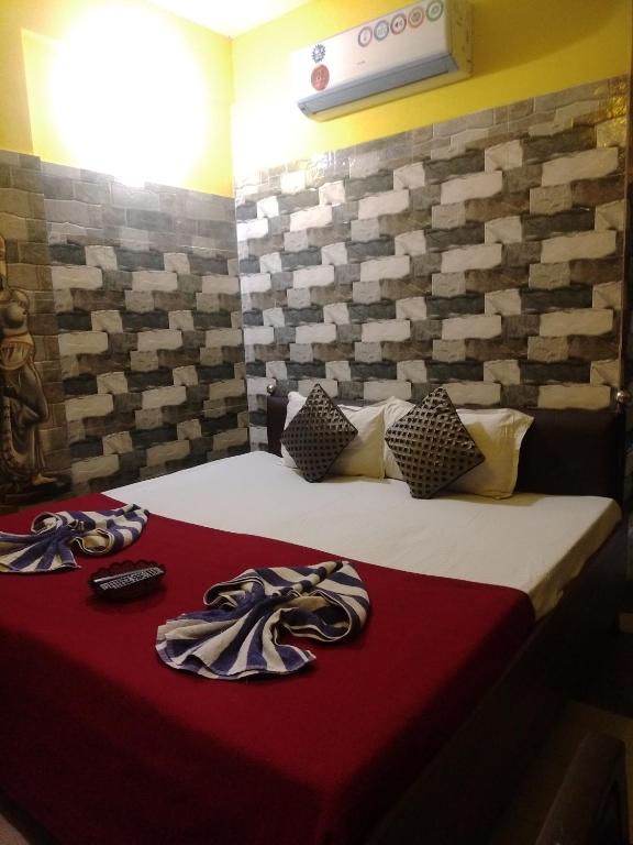 Postel nebo postele na pokoji v ubytování Baga F Leisure Stay Guest House