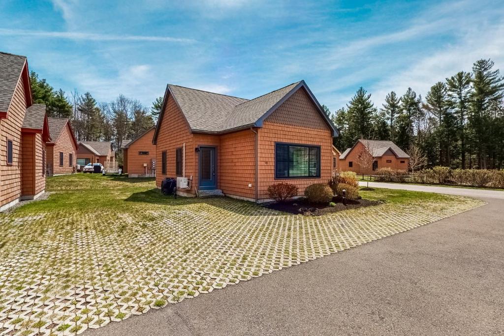 a house on a street with a driveway at Wells Wonder in Wells