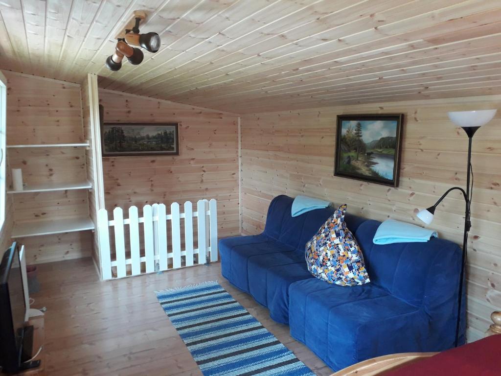 Posezení v ubytování Gästehaus Älgstuga