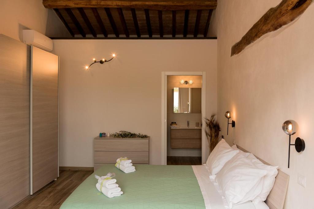 Postel nebo postele na pokoji v ubytování Agriturismo L'Aquilone
