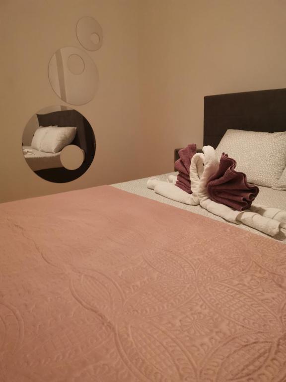 Postel nebo postele na pokoji v ubytování Apartmani "Mary"