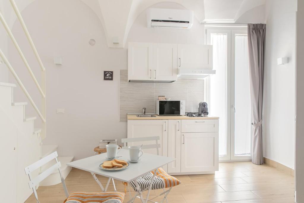 Kuchyňa alebo kuchynka v ubytovaní Mare all'Arco Casa Vacanze