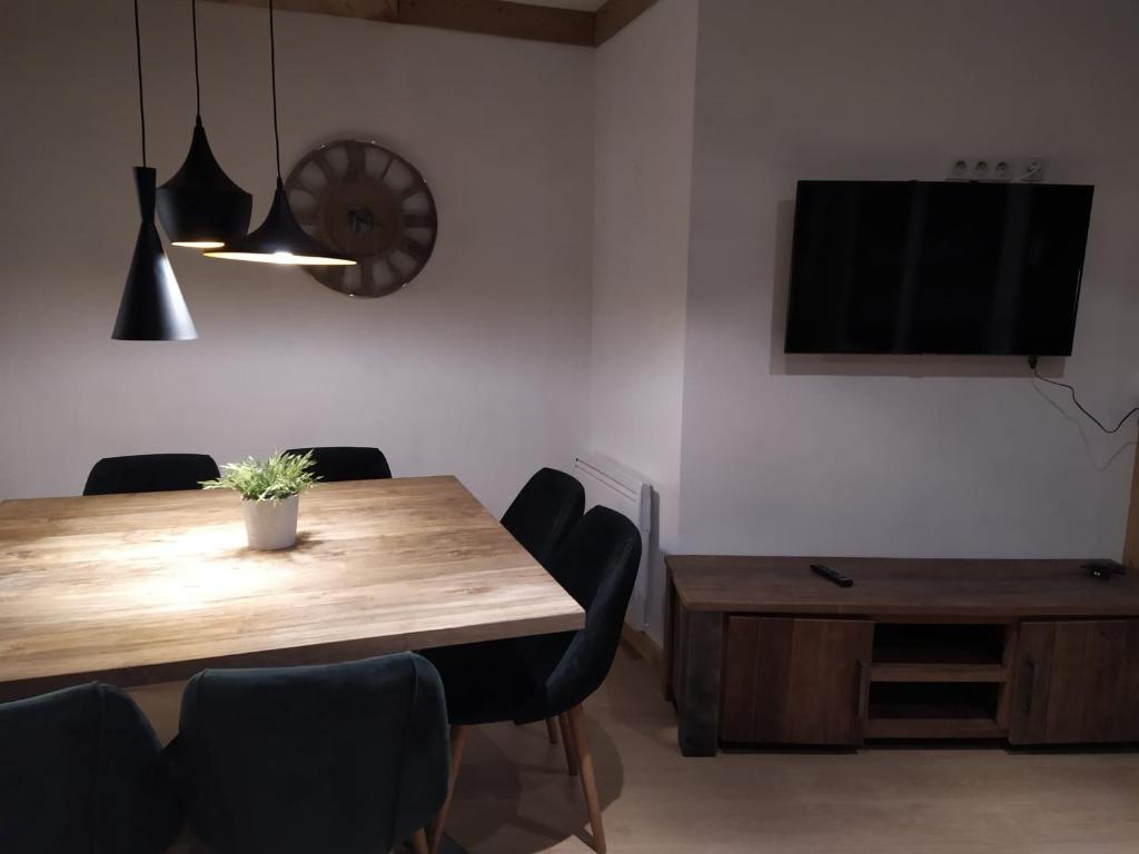TV a/nebo společenská místnost v ubytování Cocoonabay Appartements