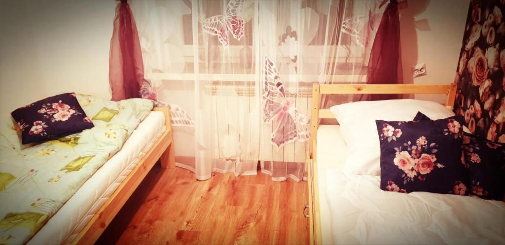 Posteľ alebo postele v izbe v ubytovaní Apartament Wrzos Bieszczady