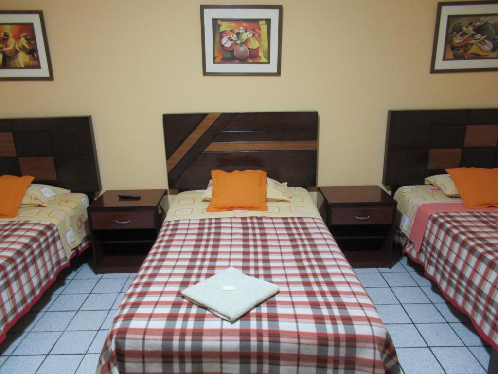 Postel nebo postele na pokoji v ubytování Kurmi Hostel Lima Airport