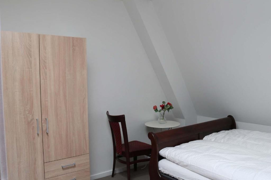Voodi või voodid majutusasutuse Budget Rooms Copenhagen toas