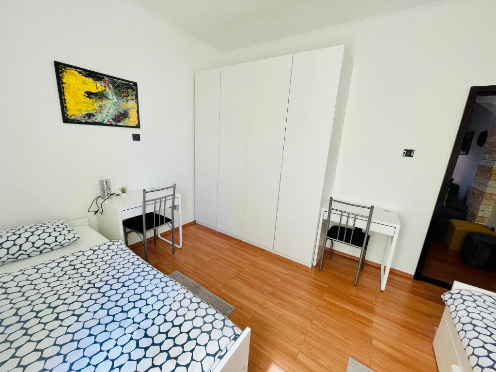 Posteľ alebo postele v izbe v ubytovaní Apartman Three Queens